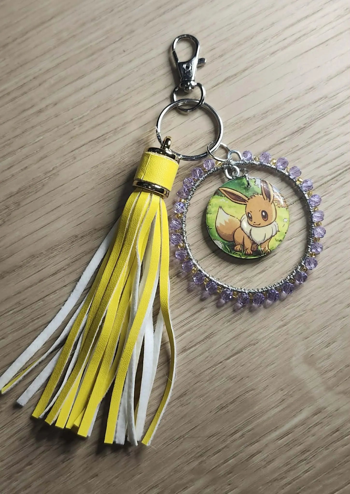 Handmade Eevee Keychain | Pokémon Bag Charm | Cute Kawaii Anime Keyring | Purple Beaded Charm with Tassel | Geek Gift for Women