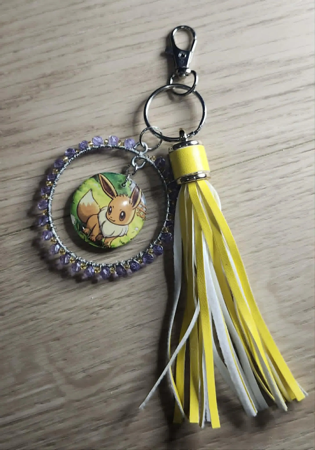 Handmade Eevee Keychain | Pokémon Bag Charm | Cute Kawaii Anime Keyring | Purple Beaded Charm with Tassel | Geek Gift for Women
