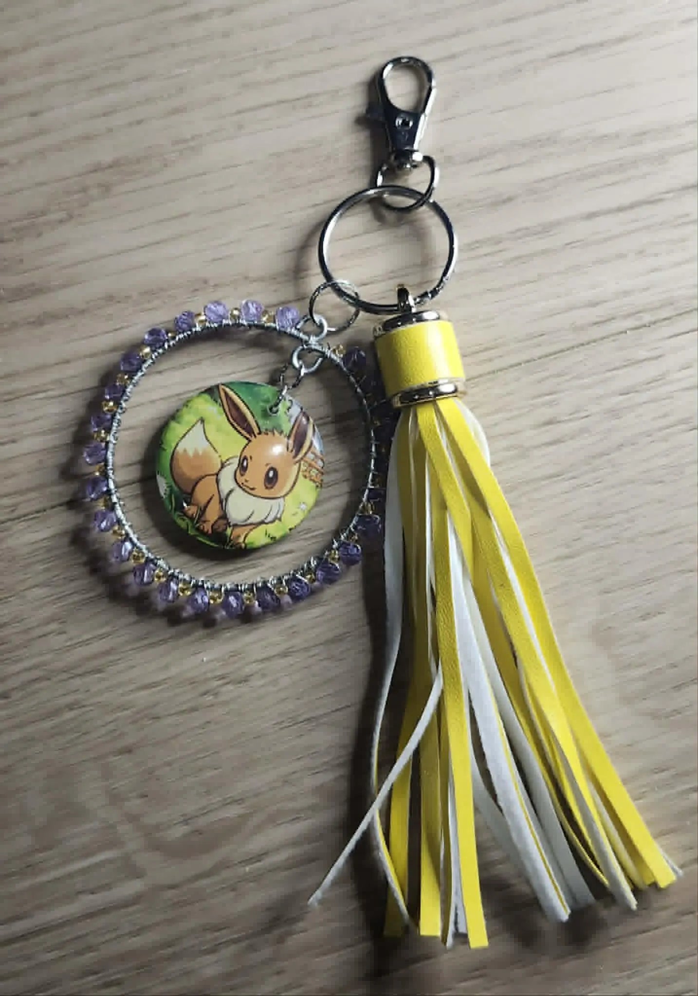 Handmade Eevee Keychain | Pokémon Bag Charm | Cute Kawaii Anime Keyring | Purple Beaded Charm with Tassel | Geek Gift for Women